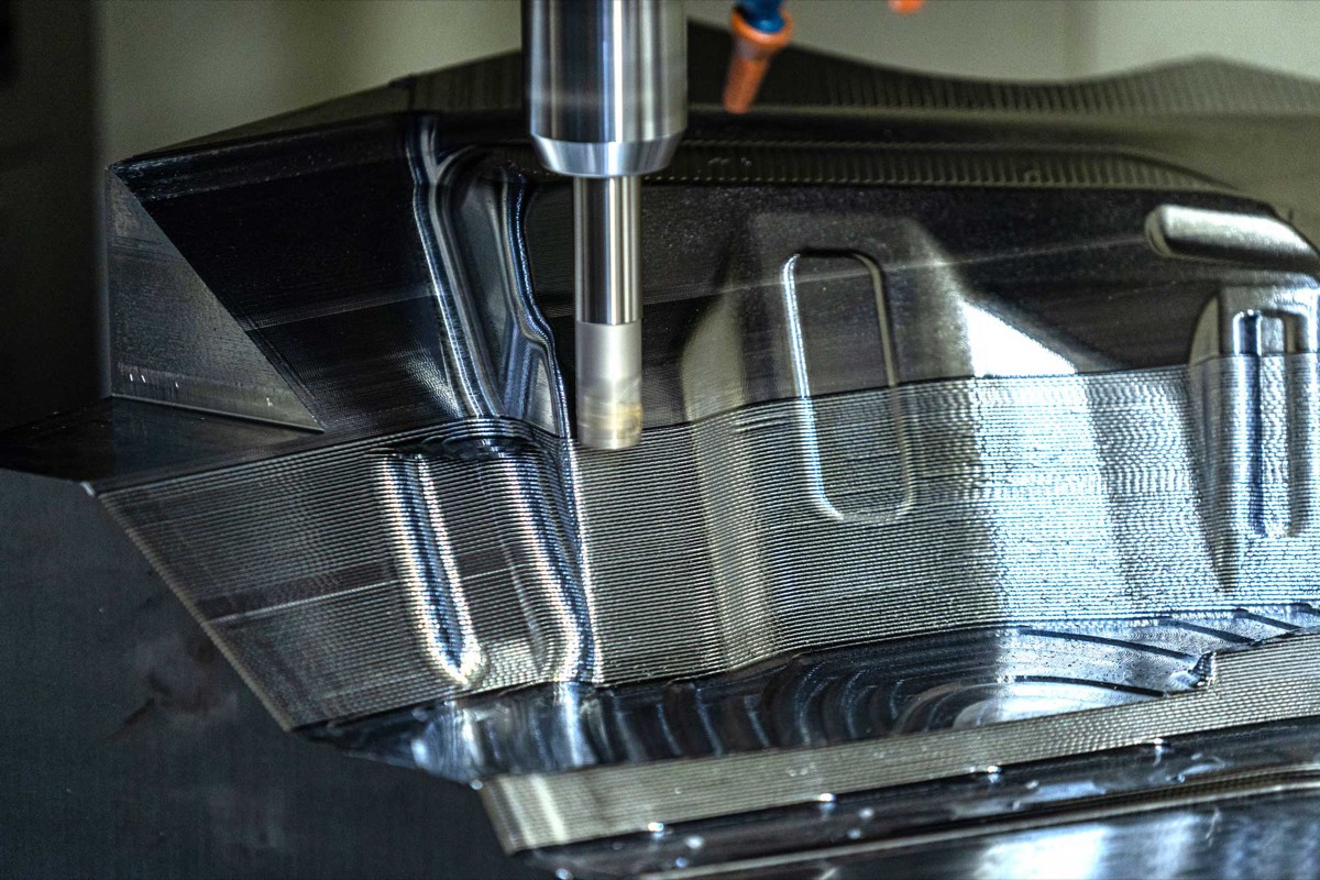 CNC end mill machining a polished stamping die at Prototier-1