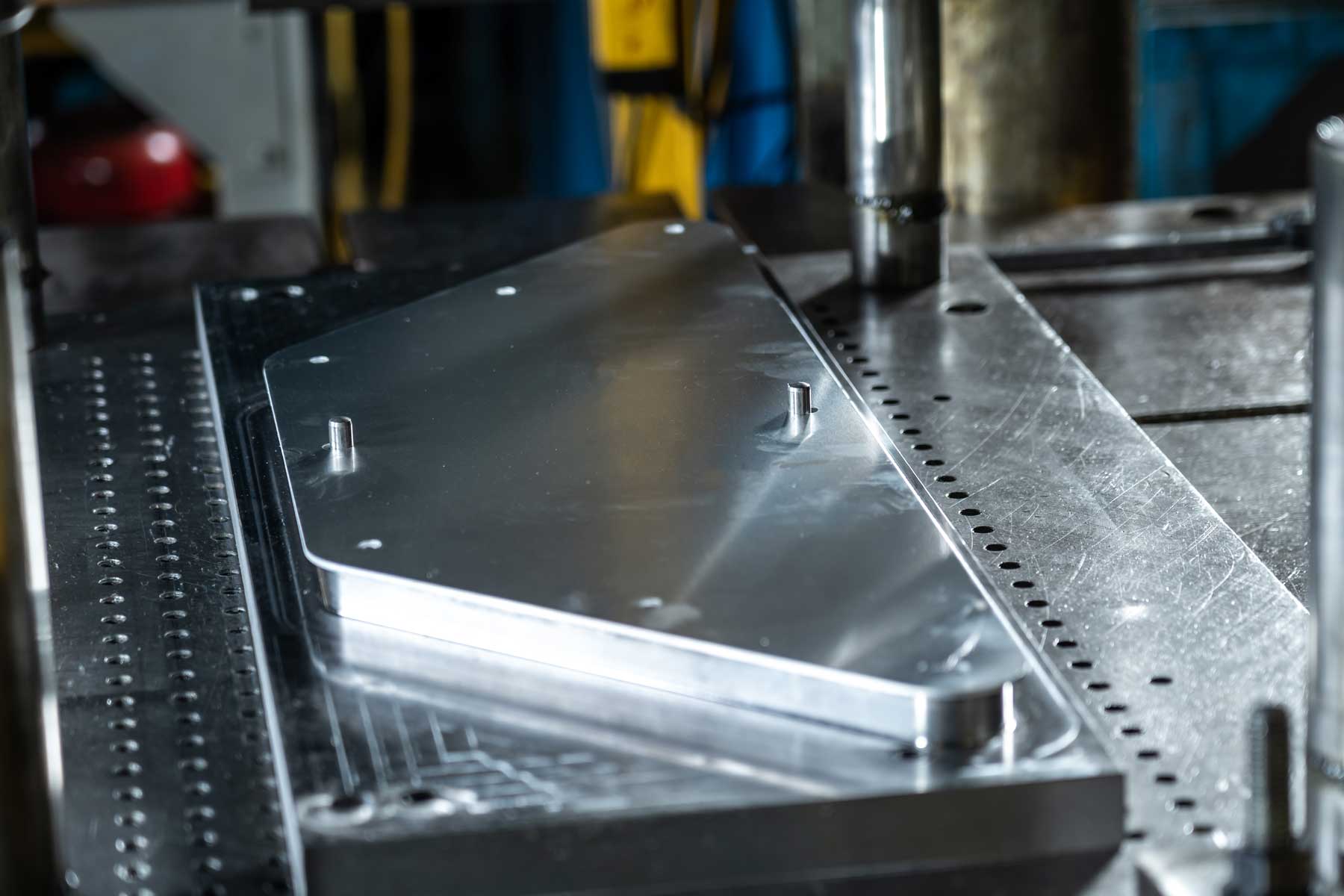 Stamped panel held in a press die at Prototier-1 in Beeton, Ontario