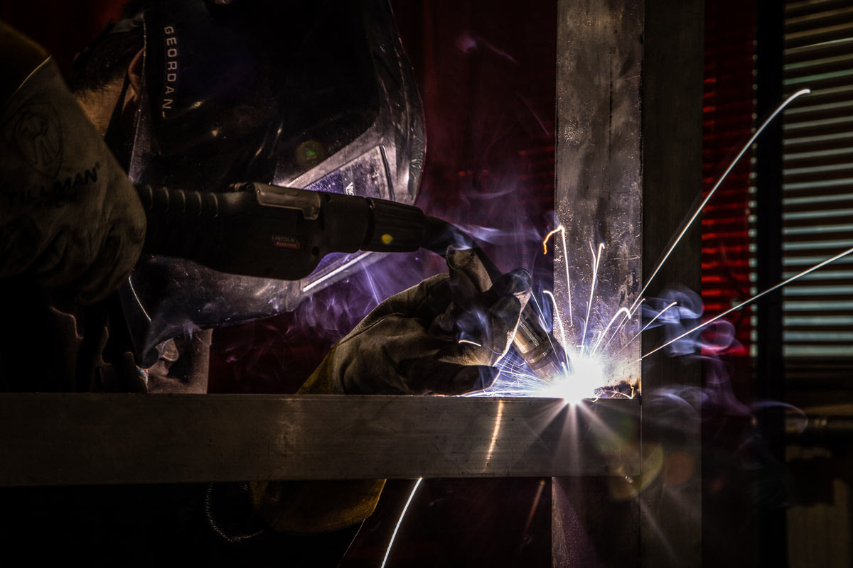MIG welding a steel assembly at Prototier-1